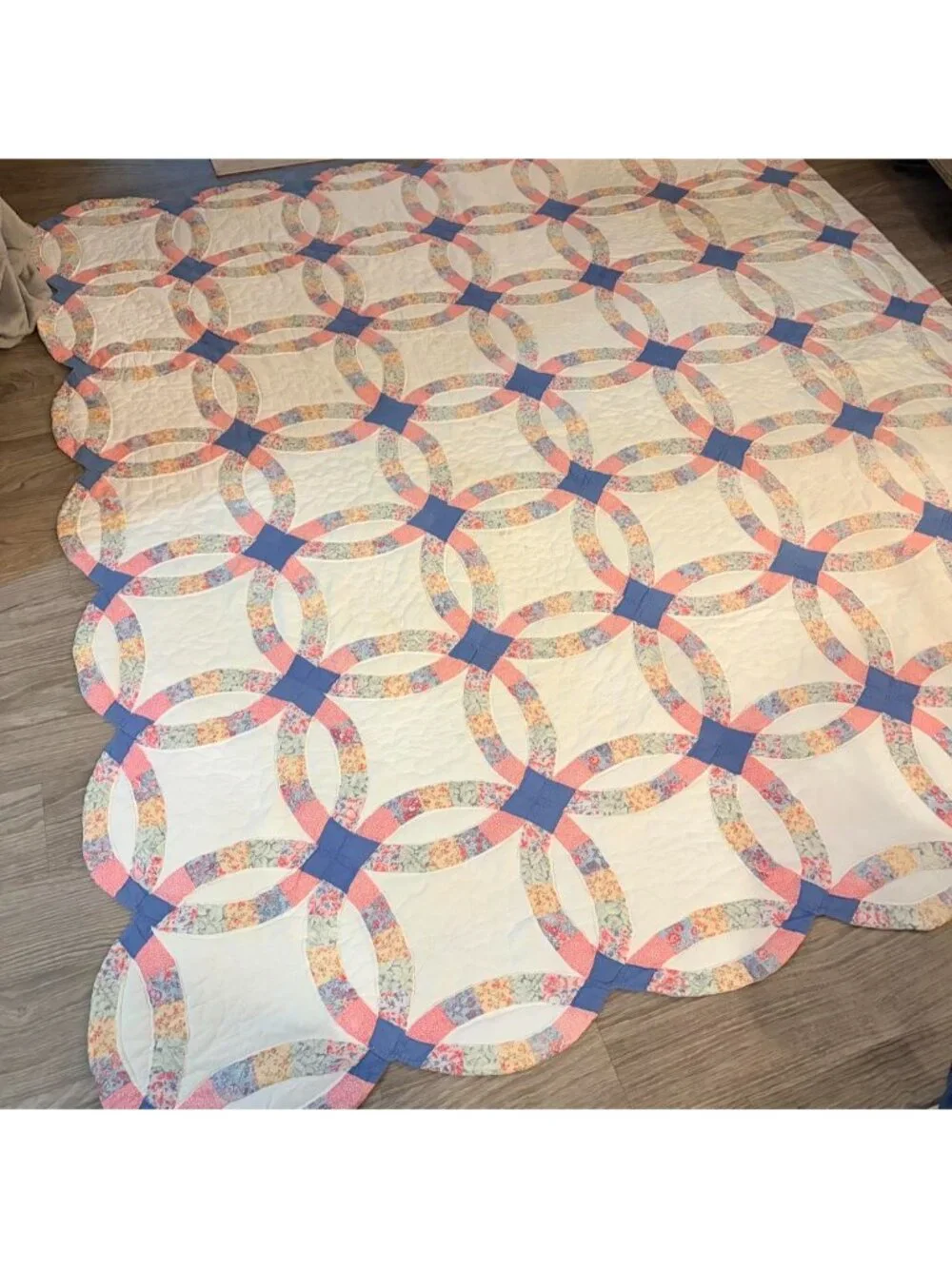 Vintage handmade pastel floral pink and blue wedding ring quilt blanket